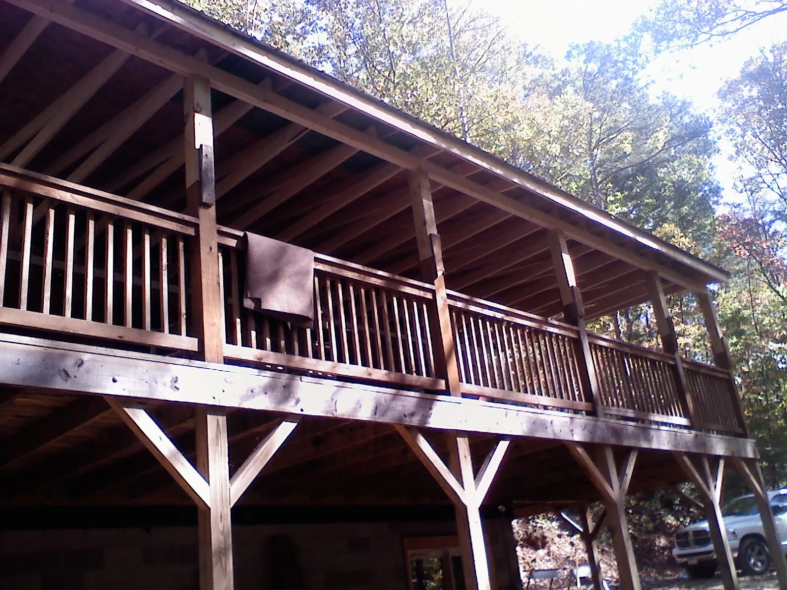 Timber framing under a new elevated porch and deck — Roof Leak Repair in Holderness by Roofing Brothers